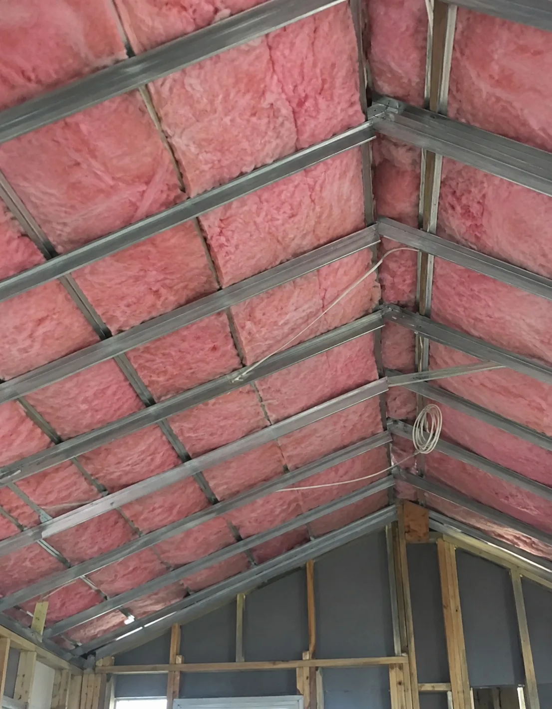 Roof structure open for insulation and underlay during a West Auckland re-roof